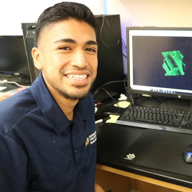 Alejandro Quiñones, 22, uses mathematical modeling to analyze cell division in maize.